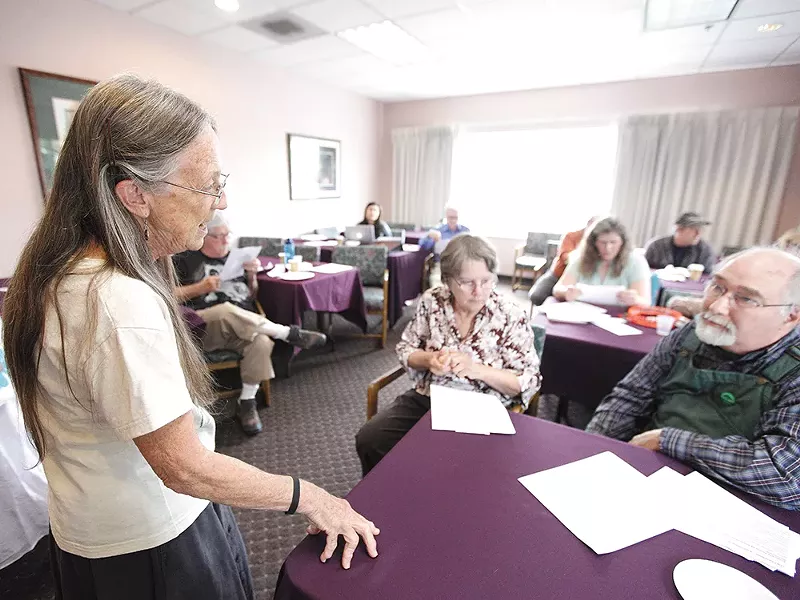Outreach Coordinator Jody Grage, left, speaks with Morton Alexander, at last weekend\'s Green Party gathering. - YOUNG KWAK