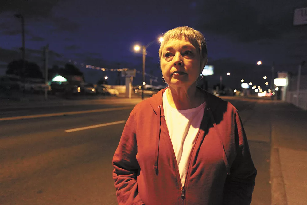 Outreach worker Lynn Everson worries that women who sell sex on East Sprague will simply move to out-of-the-way spots. - YOUNG KWAK