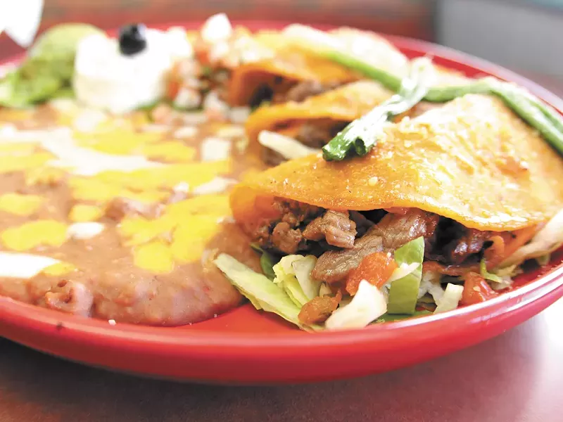 Palenque’s tacos al carbon are served with beef and traditional spices - JOE KONEK