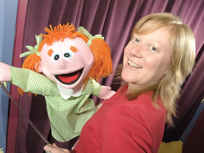 Penny Walter, with Robin: “This is going to sound hokey, but the puppets just come through me.” - STEVE HAMBUCHEN