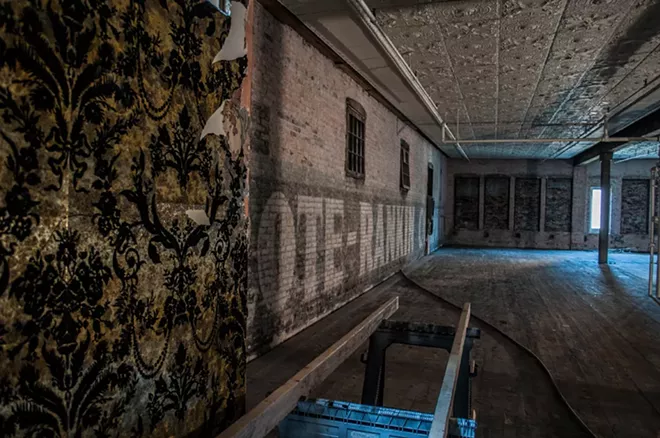 The Dania building was constructed in 1904, and was originally built between two existing structures. The west-facing building no longer exists today — it's now a parking lot — but remnants of it can be seen throughout building, especially on the allegedly haunted fourth floor. - SARAH WURTZ