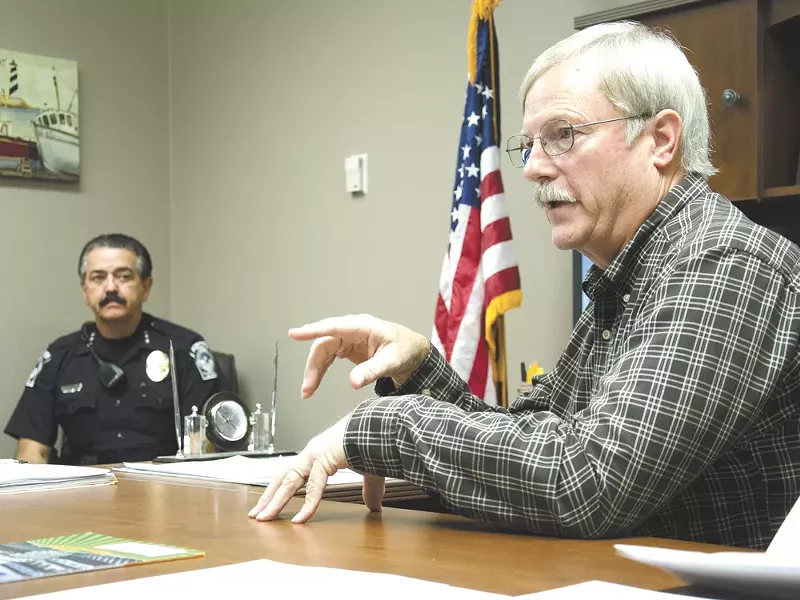 Quincy Mayor Jim Hemberry, right, and Police Chief Richard Ackerman say a new $130,000 computer program will help curb gang activity. - NICK GAST