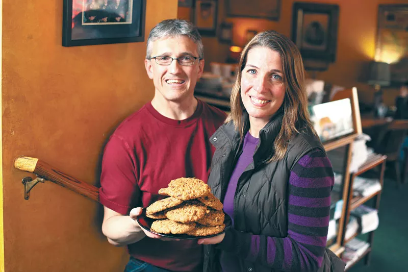 Rocket owners Jeff and Julia Postlewait at their original Millwood location with a plate of their oatie cookies. - YOUNG KWAK