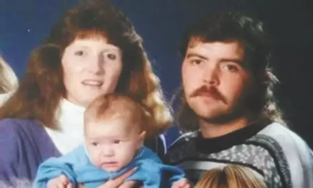 Sara Elkhiyati and John Everitt, with Levi as a baby.
