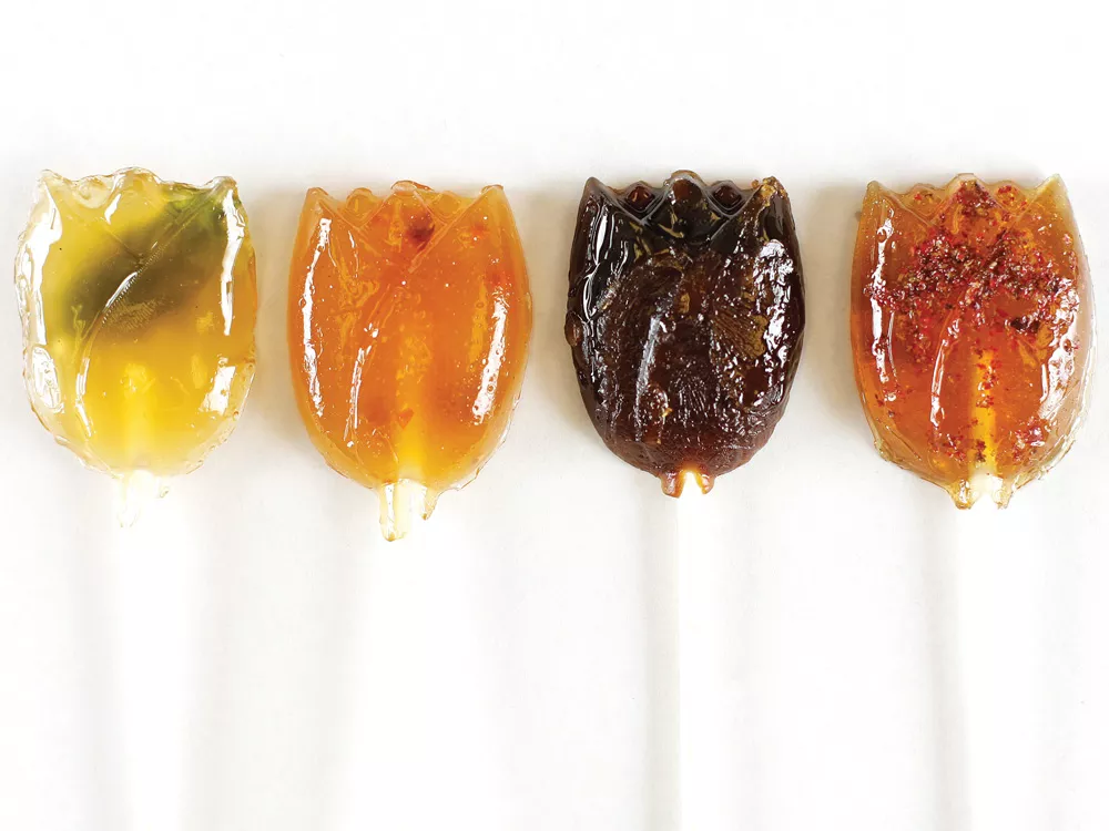 Savor Sweets promises gourmet lollipops, like basil, habanero, espresso and pink peppercorn lollipops. - YOUNG KWAK