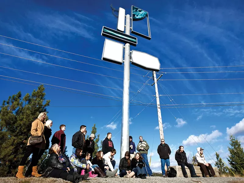 SFCC art students pose with 'Sign Post.' - MIKE MCCALL
