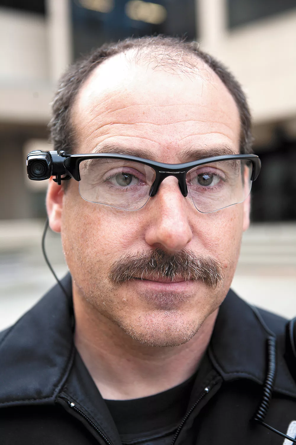 Spokane police tested a glasses-mounted camera before later selecting a simpler chest-mounted model. - STEPHEN SCHLANGE PHOTO