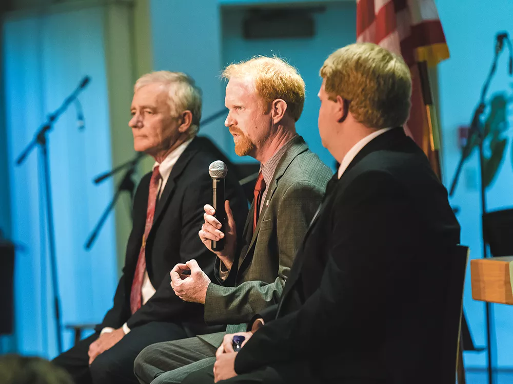 State Sen. John Smith responds to a question at the debate where he faced off with Mike Brunson (left) and Brian Dansel (right). - STEPHEN SCHLANGE