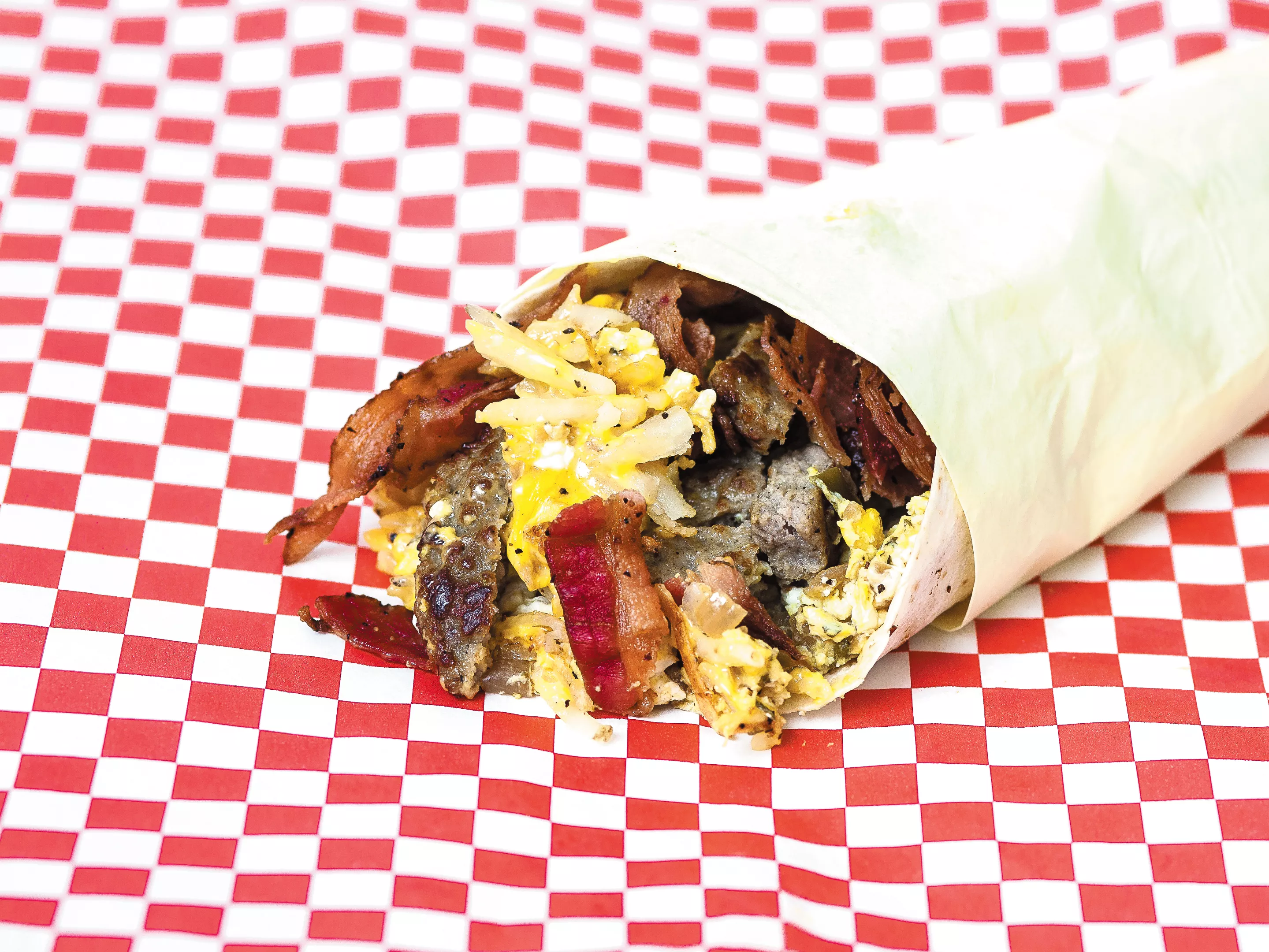 The bacon/sausage combo breakfast burrito at the Big Yellow Mobile Kitchen in Coeur d\'Alene. - MIKE MCCALL