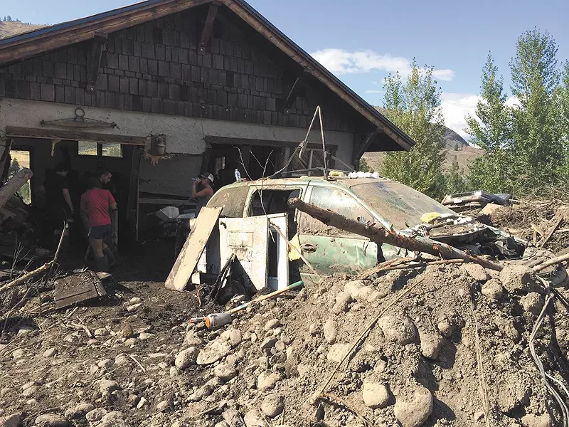 The garage of Bob Elk Belgard and Janie Lewis. - SCOTT A. LEADINGHAM