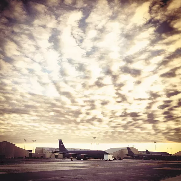 The late afternoon sky at Fairchild before our initial flight, with our military liaisons and fellow journalists. - YOUNG KWAK