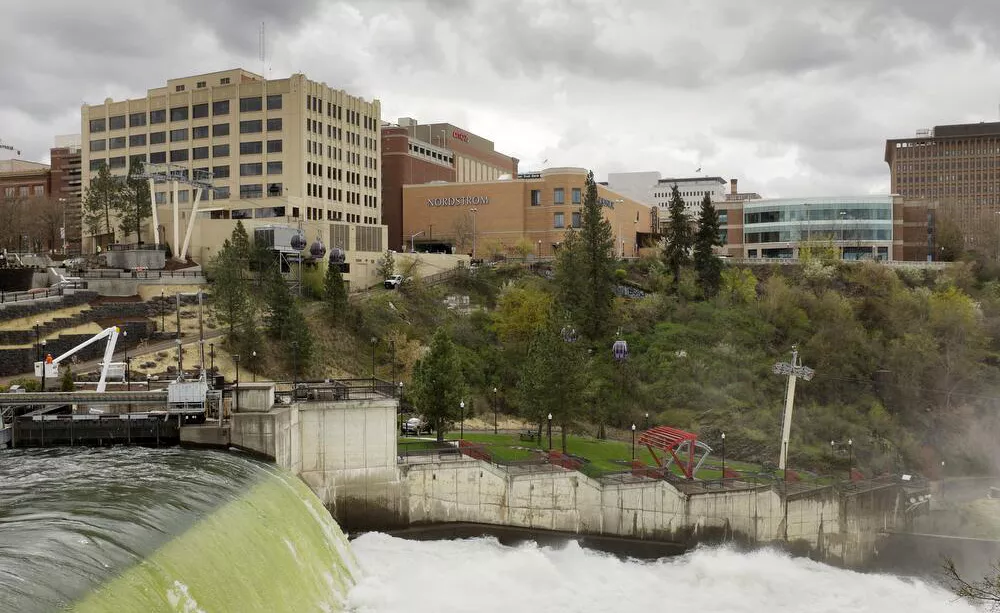 The newly beautified Huntington Park and plaza by City Hall won't be named after Spokane founding father James Glover after all. - YOUNG KWAK