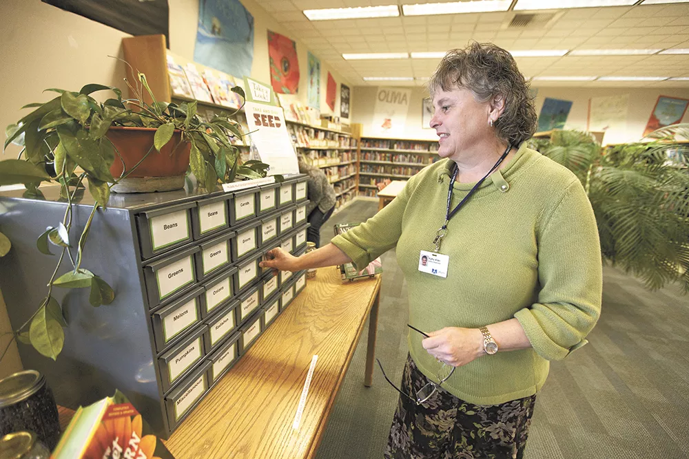 The Otis Orchards seed library has lent hundred of seed packets since launching in February with the help of supervisor Kathy Allen. - YOUNG KWAK