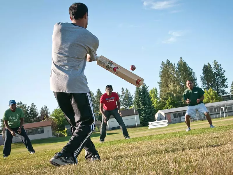 The Spokane Spartans take batting practice. - AMY HUNTER