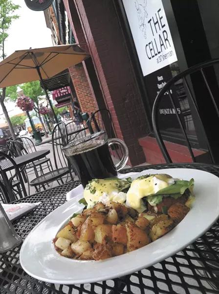The steelhead eggs Benedict is just one of the items on the Cellar's new breakfast menu. - CARRIE SCOZZARO