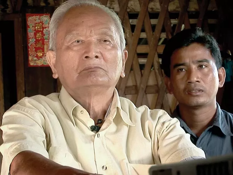 Thet Sambath, right, with Pol Pot's right hand.