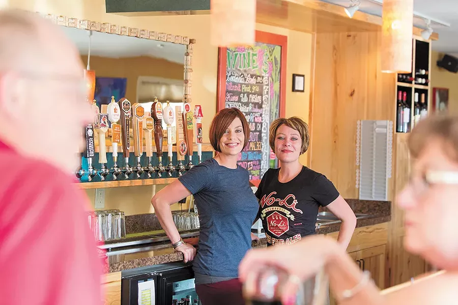 Twin sisters Emily Redington and Mel Wood recently bought the Hop Shop. - WATT WEIGAND