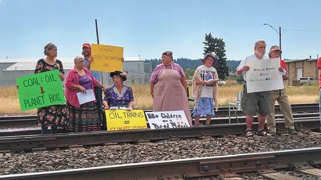 Three "Raging Grannies" were arrested after blocking the tracks last year, a protest that local activists hope will lead to a wave of more civil disobedience. - PHOTO COURTESY OF DEENA ROMOFF