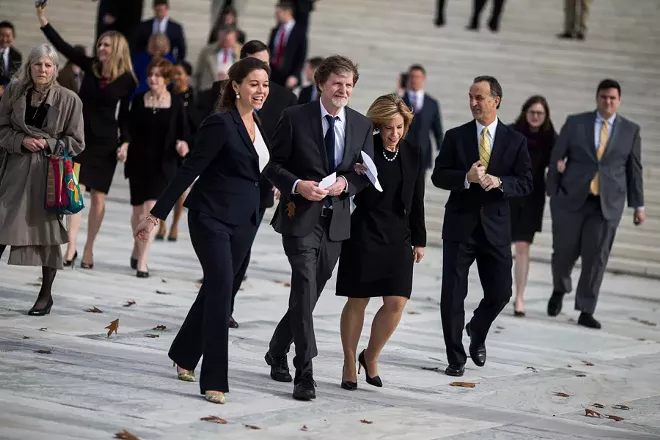 Jack Phillips, center, the baker who was convicted under a Colorado anti-discrimination law for refusing to make a wedding cake for a gay couple, outside the Supreme Court building in Washington, Dec. 5, 2017. The court sided with Phillips on June 4, 2018, in the closely watched case pitting gay rights against claims of religious freedom. - ZACH GIBSON/THE NEW YORK TIMES