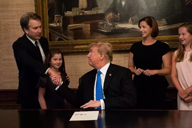 President Donald Trump with Judge Brett Kavanaugh, his nominee for the Supreme Court, and Kavanaugh's wife, Ashley, and their daughters in the residence of the White House in Washington, July 9, 2018. - DOUG MILLS/THE NEW YORK TIMES