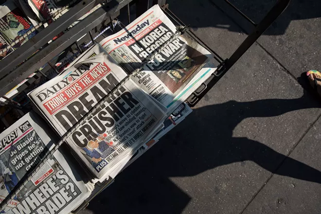 Copies of The New York Daily News on sale in Manhattan, the day after the paper was sold to Tronc, Sept. 5, 2017. Reporters and editors at The Daily News were been told that the newsroom staff was being cut in half and that the editor in chief, Jim Rich, was out of a job on July 23, 2018. Grant Whitmore, an executive at Tronc, the media company that owns The News, presided over the meeting, which took place in its newsroom in Manhattan. The new editor in chief is Robert York, currently the editor and publisher of The Morning Call, a Tronc-owned daily newspaper in Allentown, Pa. - DAMON WINTER/THE NEW YORK TIMES