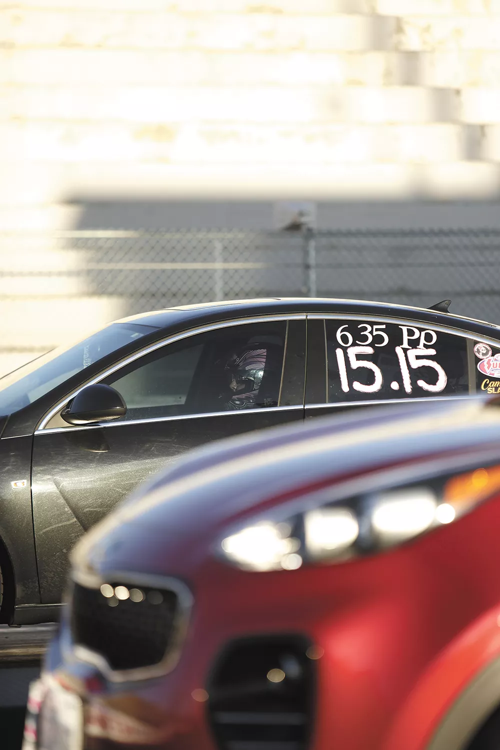 Heather Eller is all business waiting at the starting line in her 2011 Buick Regal Turbo. - YOUNG KWAK