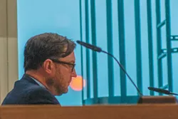 Spokane City Council President Ben Stuckart uses smoke to ream opponents of a renewable energy ordinance (2)