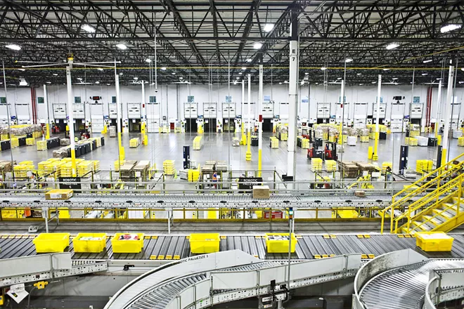 An Amazon warehouse in Florence, N.J., Aug. 29, 2017. Amazon has become the second American company to cross the once-unimaginable line of a trillion-dollar market valuation. The company now captures 49 cents out of every e-commerce dollar in the United States. - BRYAN ANSELM/THE NEW YORK TIMES
