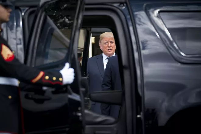 Seen through and SUV door, President Donald Trump greets Polish President Andrzej Duda upon his arrival to the White House, in Washington, Sept. 18, 2018. President Trump falsely charged on Tuesday that Democrats had sought to time a sexual assault allegation against his Supreme Court nominee, Judge Brett Kavanaugh, to obstruct his confirmation, siding with the judge as he called for a swift process for airing the accusation on Capitol Hill. - DOUG MILLS/THE NEW YORK TIMES
