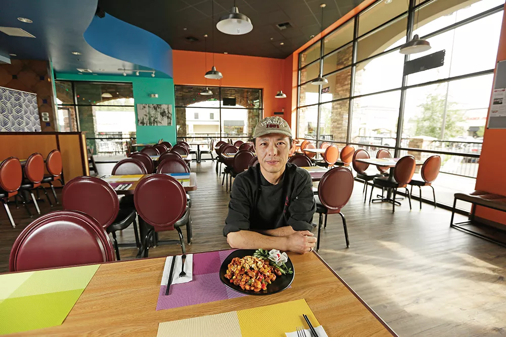 Jianjun "JJ" Lu, aka Chef Lu, serves family style, authentic Chinese cuisine at his South Hill Asian Bistro. - YOUNG KWAK