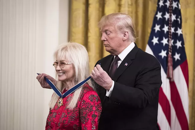 President Donald Trump presents the Presidential Medal of Freedom to Miriam Adelson during a ceremony at the White House, in Washington, Nov. 16, 2018. Adelson is a doctor, philanthropist and the wife of Sheldon Adelson, a casino magnate and multibillionaire. - SARAH SILBIGER/THE NEW YORK TIMES