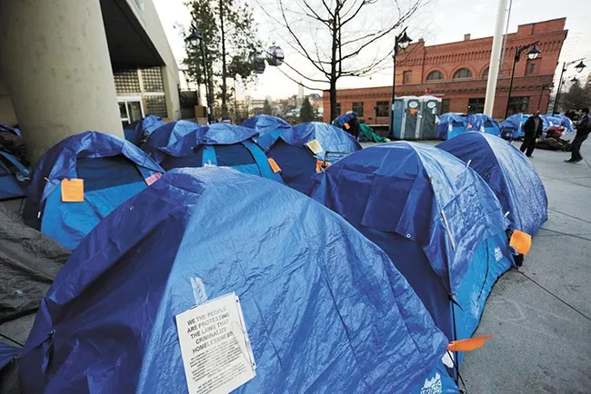 The 1,245 homeless people counted in Spokane and Spokane County last January is nowhere close to the number in other major cities. - YOUNG KWAK