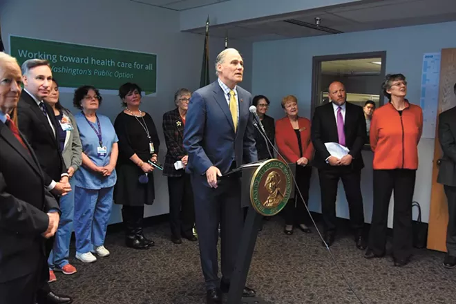 Jay Inslee argues that many counties in Washington state are "on the knife's edge" of losing health-care coverage at a press conference announcing a "public option" this month. - OFFICE OF THE GOVERNOR PHOTO
