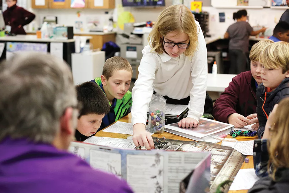 Kids slaying some orcs and finding treasure at one of RPG Research's regular sessions at Kendall Yards' Spark Central. - YOUNG KWAK PHOTO