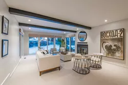 Wool carpet is a soft backdrop for the many textures showcased in ample seating options in the living room. - ERICK DOXEY PHOTO