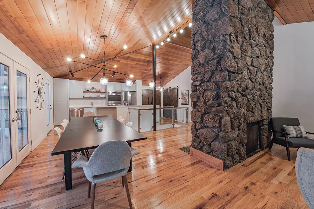 Removing the walls that isolated a tiny, dark kitchen revealed an expansive area flooded with natural light. - ERICK DOXEY PHOTO