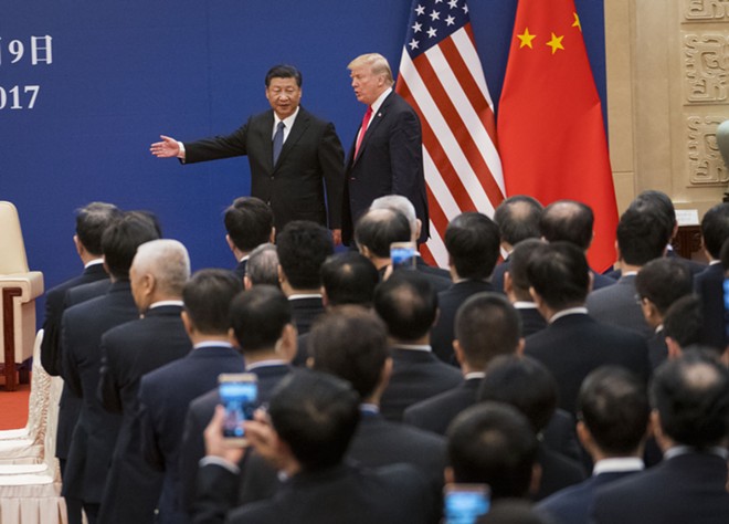 President Donald Trump and President Xi Jinping of China in Beijing, Nov. 9, 2017. Trump upended what appeared to be steady progress toward reaching a trade pact after he threatened on May 5, 2019, to impose still more tariffs on Chinese-made goods unless Beijing moves closer to a deal. Amid uncertainly over trade talks set to take place in the coming week, economists and investors worry that new tariffs would stop China’s economic recovery. - DOUG MILLS/THE NEW YORK TIMES