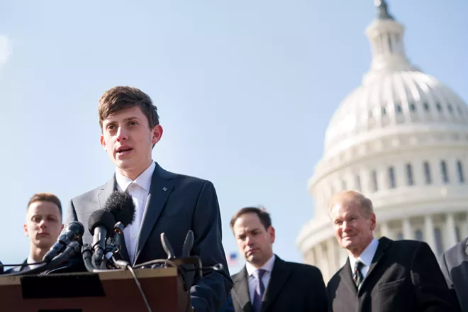 Kyle Kashuv, a student survivor of the Marjory Stoneman Douglas High School shooting, joins Senators to speak at a news conference about support for the STOP School Violence Act, outside the U.S. Capitol in Washington, March 13, 2018. In the background from right is: Sens. Bill Nelson (D-Fla.) and Marco Rubio (R-Fla.). Kashuv said that Harvard College rescinded its admission offer over racist and offensive remarks he made as a 16-year-old student. - ERIN SCHAFF/THE NEW YORK TIMES