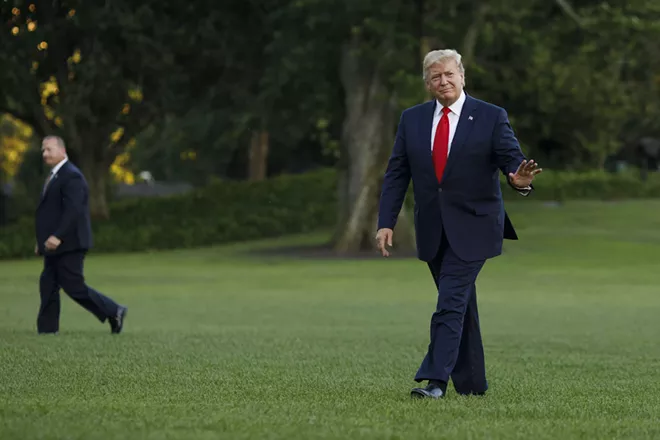 President Donald Trump returns after a multi-day trip to Asia to the White House in Washington, June 30, 2019. - TOM BRENNER/THE NEW YORK TIMES