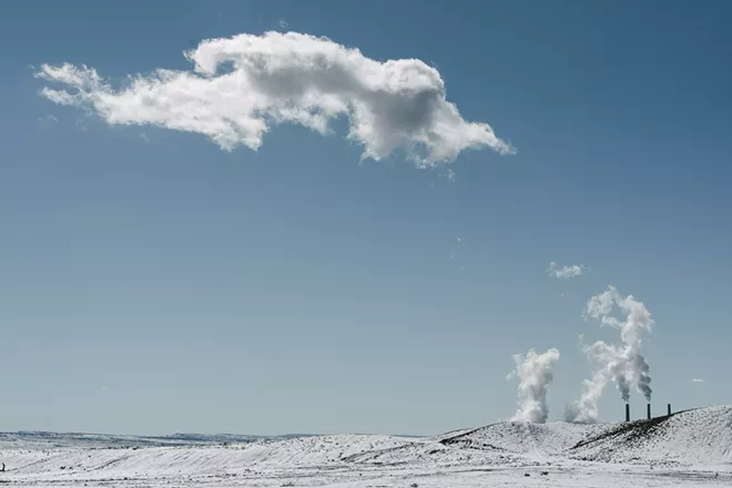 Steam billows from the PacifiCorp Hunter power plant in Castle Dale, Utah, Feb. 6, 2019. A coalition of 29 states and cities on Tuesday, Aug. 13, 2019, sued to block the Trump administration from easing restrictions on coal-burning power plants, a move that could ultimately limit how much leverage future administrations would have to fight climate change by restricting a major source of Earth-warming pollution. - BRANDON THIBODEAUX/THE NEW YORK TIMES