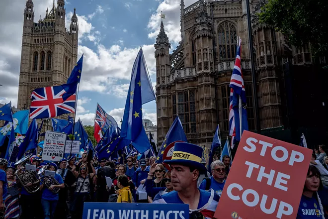 Demonstrators on both sides of the Brexit divide gathered outside Parliament in London, Sept. 3, 2019. Parliament is considering defying the prime minister by blocking a no-deal Brexit, prompting him to threaten rebels with expulsion. - ANDREW TESTA/THE NEW YORK TIMES