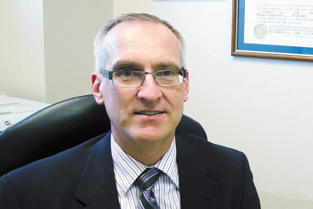 Spokane County Public Defender Tom Krzyminski says that inadequate staffing in his office and the high number of cases filed by prosecutors are behind heavy caseloads among his attorneys. - JACOB JONES PHOTO