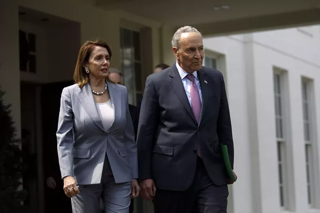 House Speaker Nancy Pelosi (D-Calif.) and House Minority Leader Chuck Schumer (D-N.Y.) approach reporters outside the White House after a meeting about infrastructure with President Donald Trump, at the White House in Washington, April 30, 2019. - TOM BRENNER/THE NEW YORK TIMES