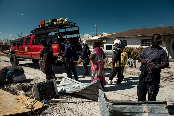 Members of a rescue team from Miami work in McLean’s Town, on Grand Bahama, the Bahamas, on Sept. 7, 2019. About 2,500 people have been reported missing in the wake of Hurricane Dorian in the Bahamas, but the names have yet to be checked against those who sought shelter or evacuated. The number of confirmed dead from the storm remained at 50, a figure that government officials say is certain to rise. - MERIDITH KOHUT/THE NEW YORK TIMES