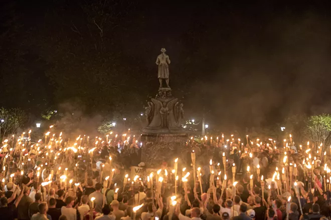 Torch-bearing white nationalists rally around a statue of Thomas Jefferson near the University of Virginia campus in Charlottesville, Aug. 11, 2017. As od late 2019, the Department of Homeland Security is beginning to address white supremacist terrorism as a primary security threat, breaking with a decade of flagging attention after bigoted mass shooters from New Zealand to Texas took the lives of nearly 100 people in the last six months. - EDU BAYER/THE NEW YORK TIMES