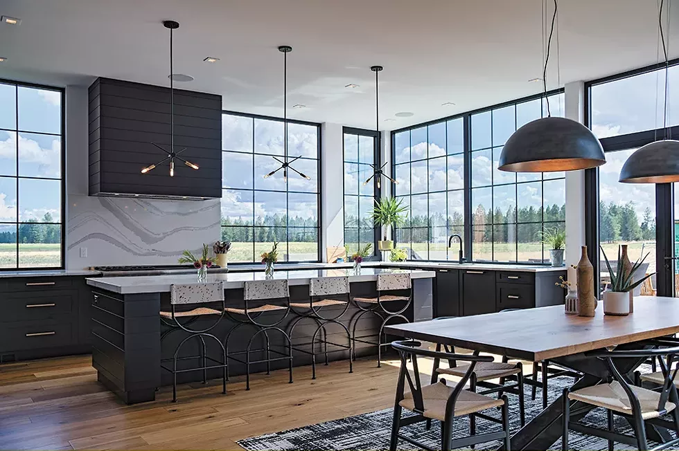 Imported large-scale windows allow sweeping views of surrounding farmland at this Uptic Studio home. - MATT VIELLE PHOTO/HAMILTON STUDIO