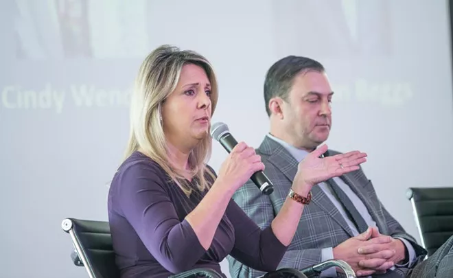 Mayoral candidates Nadine Woodward and Ben Stuckart at last month's Spokane Homeless Coalition forum. - DANIEL WALTERS PHOTO