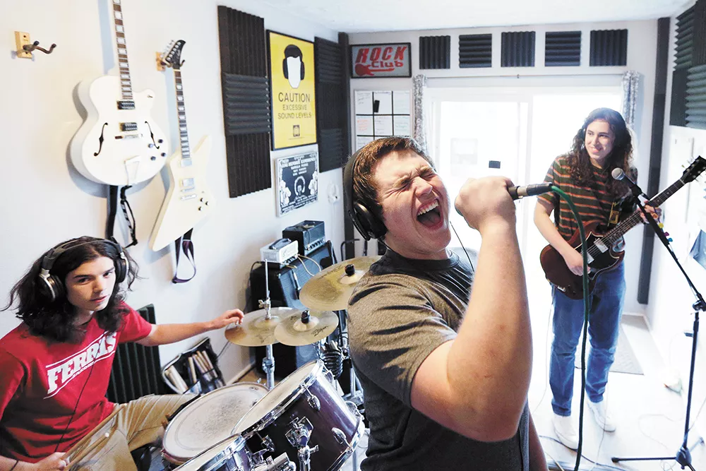 Band-in-training First Issue tackle Led Zeppelin as part of their Rock Club lessons. - YOUNG KWAK PHOTO