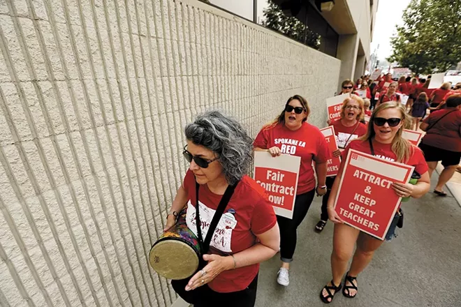 Members of the Spokane Education Association outside of Spokane Public Schools last year. - YOUNG KWAK PHOTO