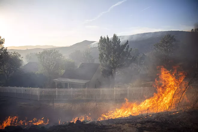 The Easy fire burns along Tierra Rejada Road in Simi Valley, Calif. on Wednesday, Oct. 30, 2019. - KYLE GRILLOT/THE NEW YORK TIMES